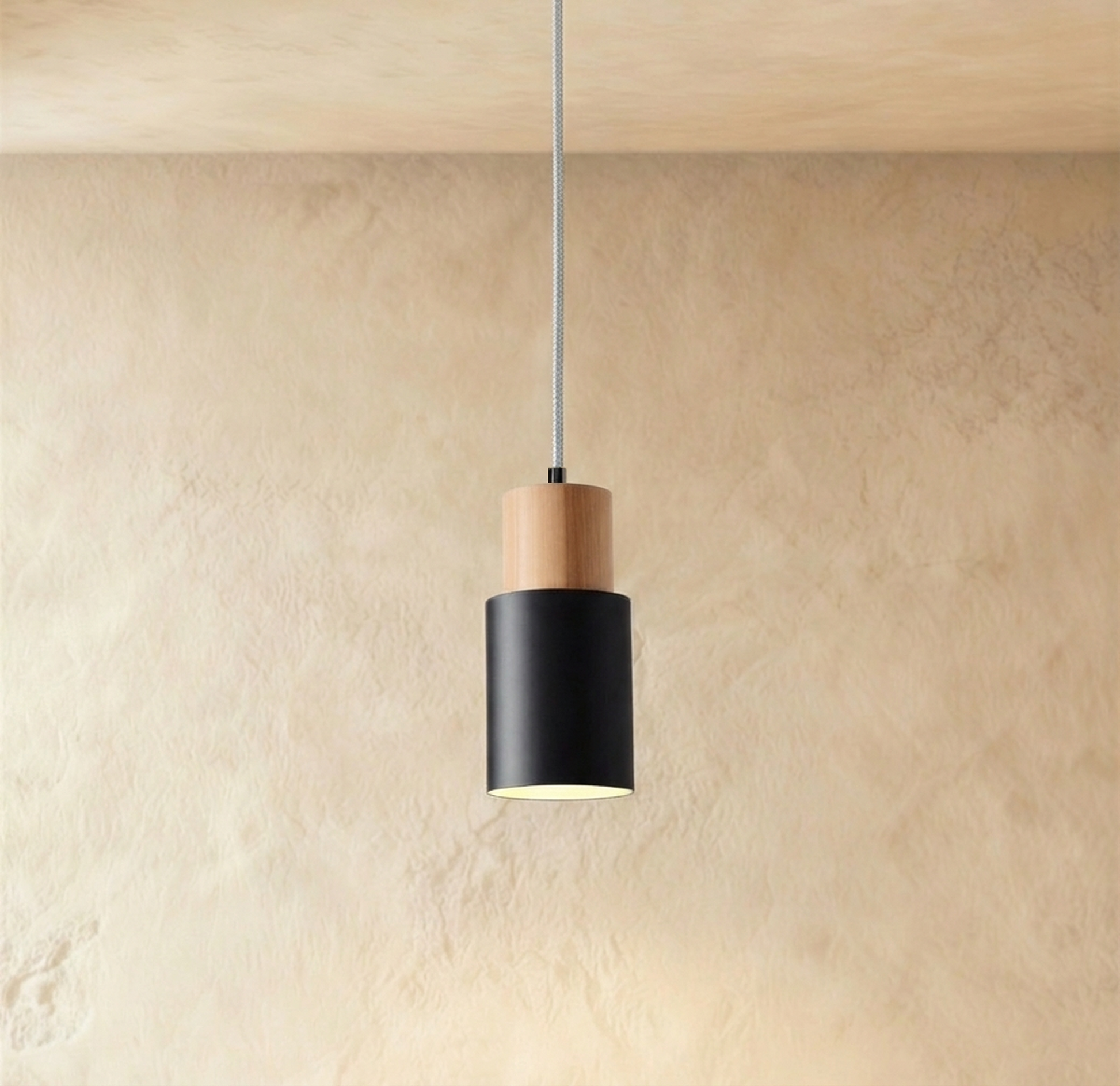 Black Nouveau pendant light by Residence Supply featuring a sleek, modern design with a metal shade and adjustable hanging cord.