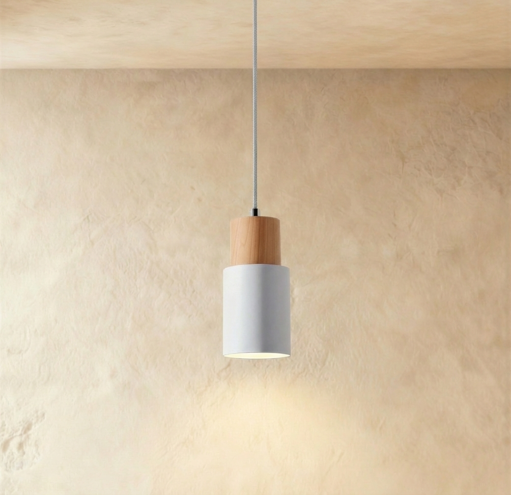 White Nouveau pendant light by Residence Supply hanging from ceiling with a sleek, modern design perfect for contemporary interiors.