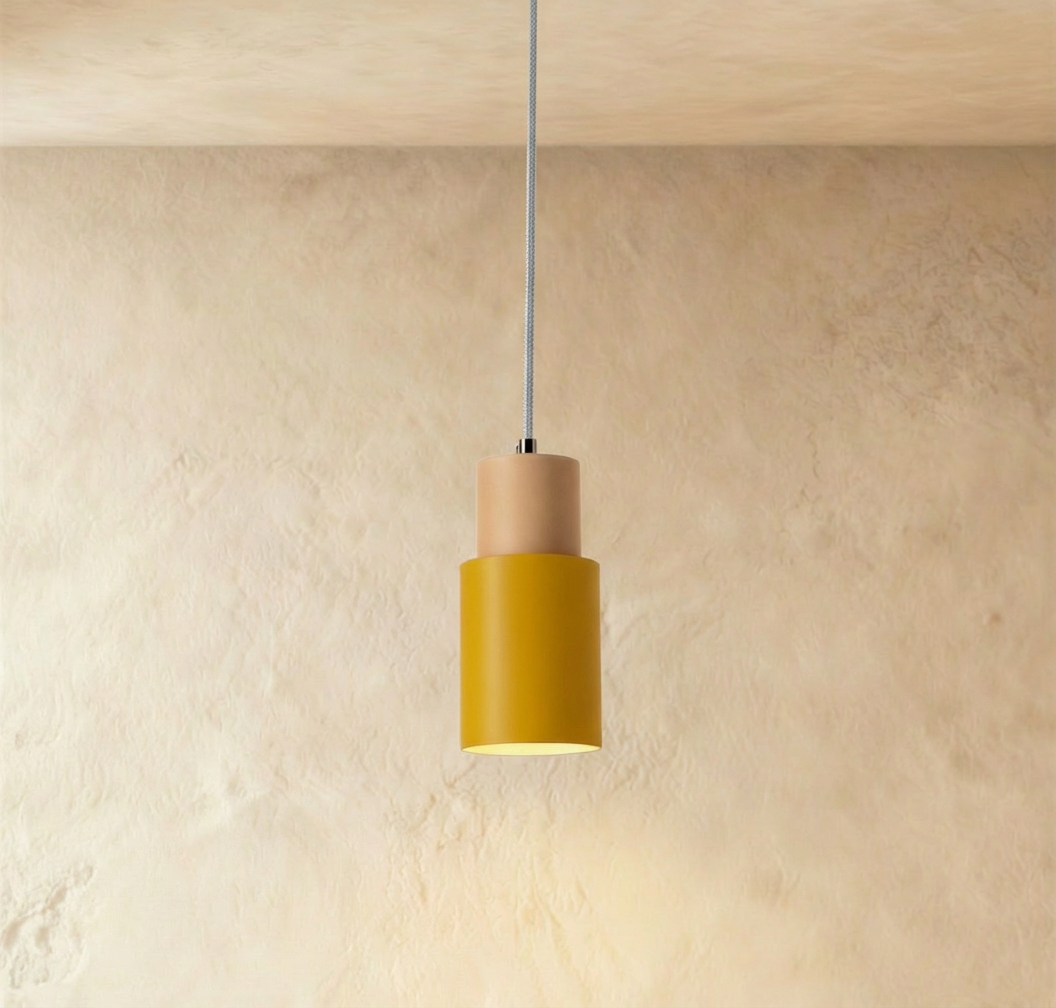 Yellow Nouveau Pendant Light by Residence Supply hanging from ceiling with modern design and sleek finish.