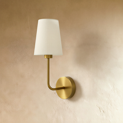 Residence Supply Shira wall lamp with sleek design, mounted on a plain background, showcasing its modern, minimalist style.