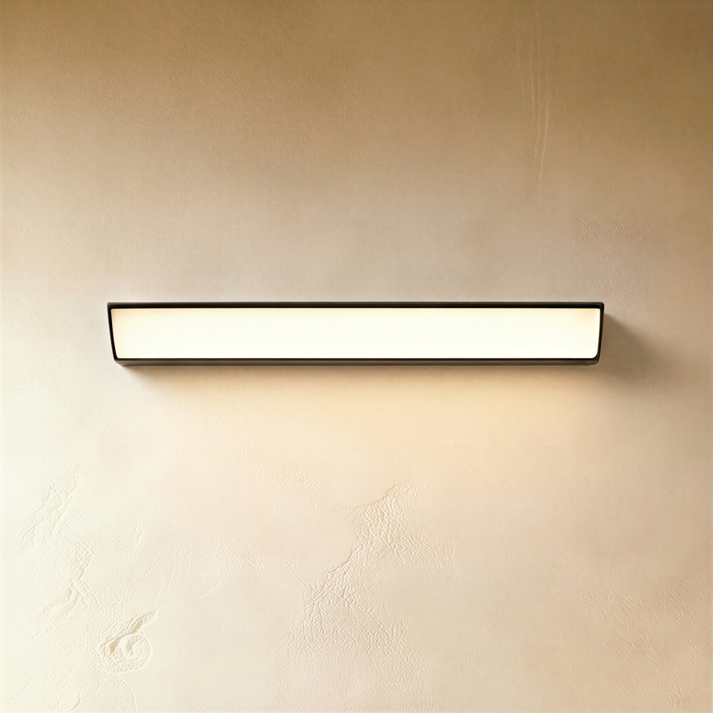 Black Sopdet outdoor wall lamp by Residence Supply, featuring a sleek design and illuminated in an outdoor setting.