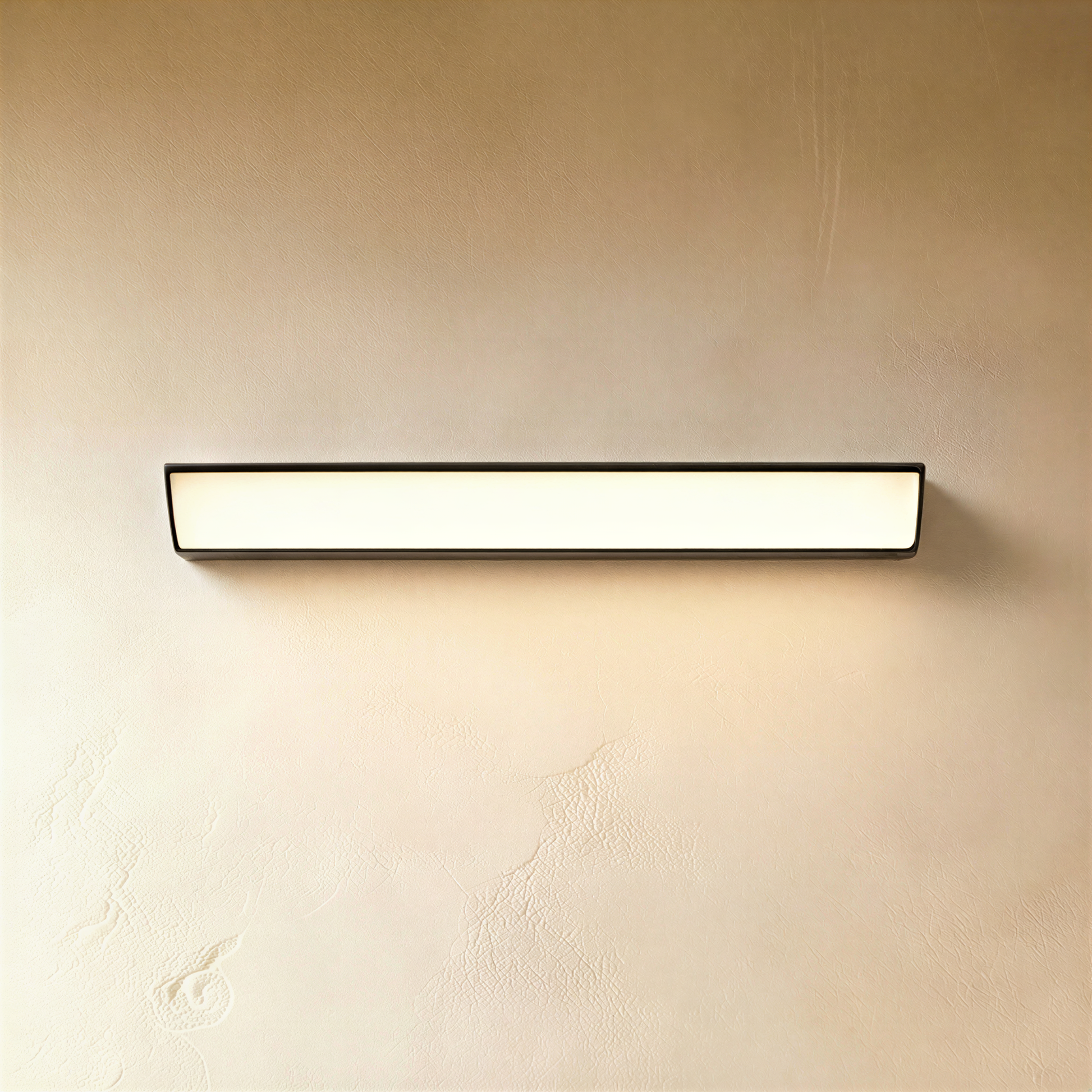Black Sopdet outdoor wall lamp by Residence Supply, featuring a sleek design and illuminated in an outdoor setting.