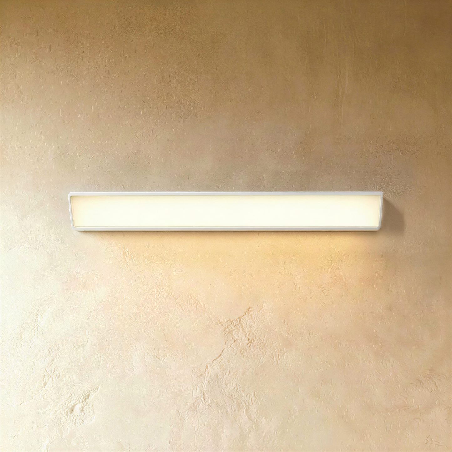 White Sopdet outdoor wall lamp by Residence Supply mounted on exterior wall, illuminated with modern design.