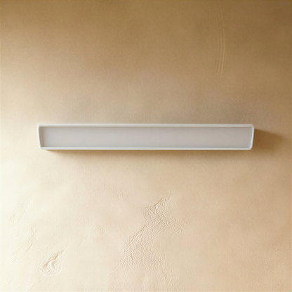 White Sopdet outdoor wall lamp by Residence Supply, featuring a sleek modern design and mounted on an exterior wall.