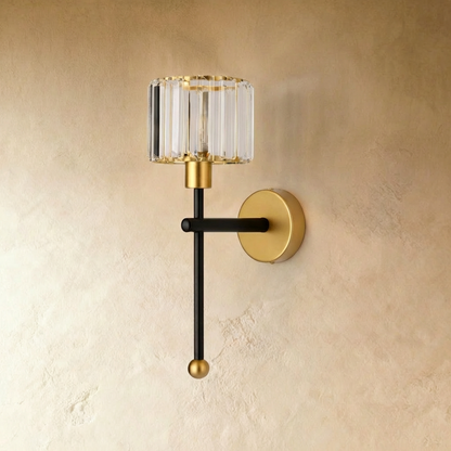 Black Nagis Wireless Wall Lamp by Residence Supply mounted on a plain background, showcasing its sleek, modern design and compact form.