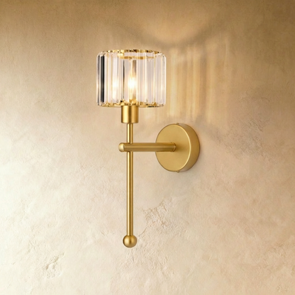 Gold Nagis wireless wall lamp by Residence Supply mounted on a plain background, showcasing modern design and sleek finish.