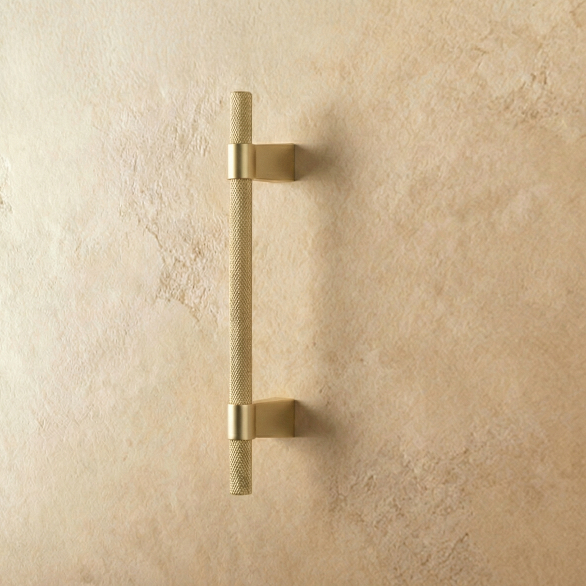 Golden Varai knob and pull bar from Residence Supply, sleek cabinet hardware with a polished finish, 22.4cm length.