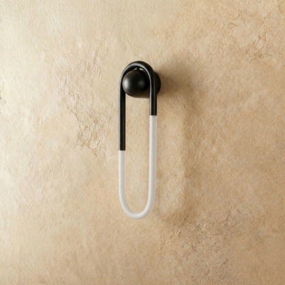 Black Zenn Wall Lamp by Residence Supply mounted on plain background, showcasing sleek modern design and minimalist style.