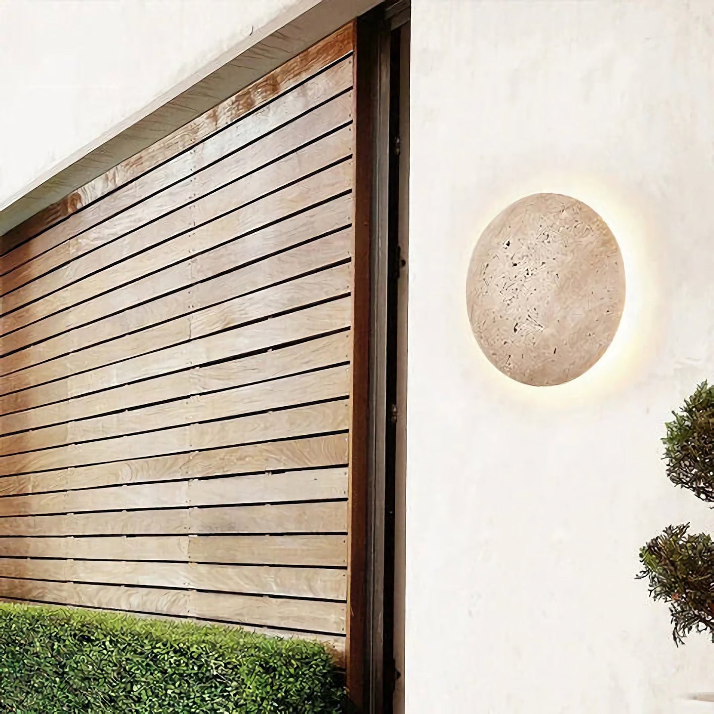 Yellow travertine round wall lamp by Korewolamp featuring a smooth stone finish and modern circular design for elegant lighting.