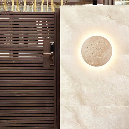 Yellow travertine round wall lamp by Korewolamp, showcasing a stylish stone wall-mounted lighting fixture with a smooth, rounded design.