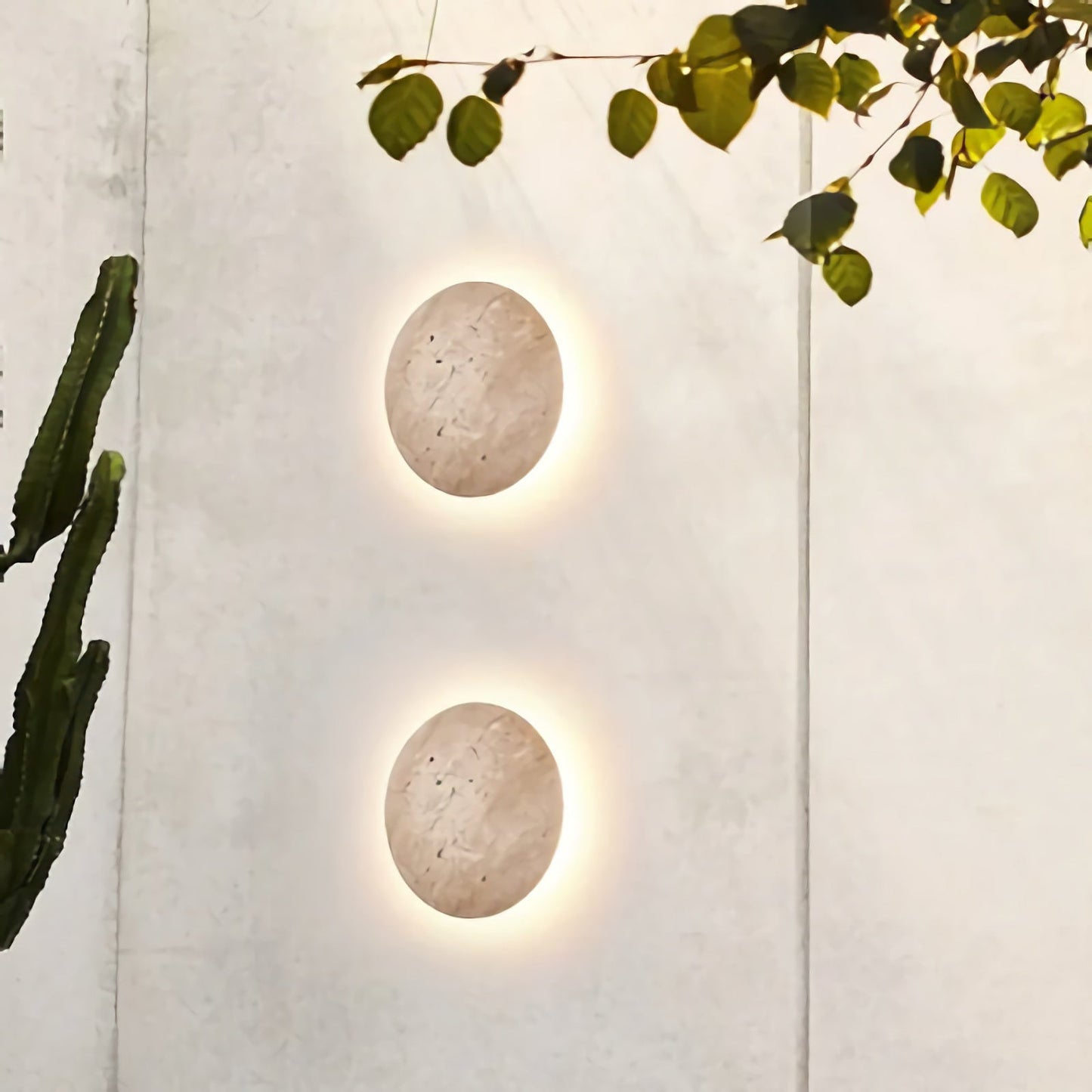 Yellow travertine round wall lamp by Korewolamp, showcasing a smooth stone surface and modern wall-mounted design.