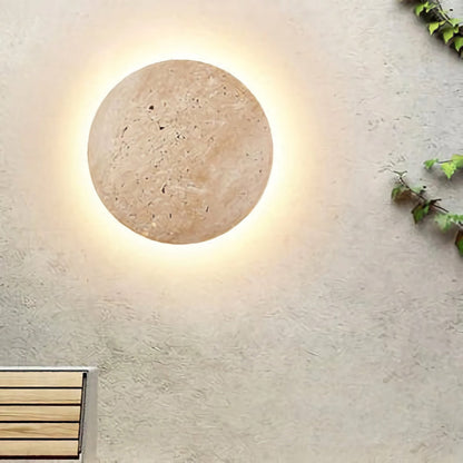 Yellow travertine round wall lamp by Korewolamp, showcasing a smooth stone finish and modern wall-mounted design.