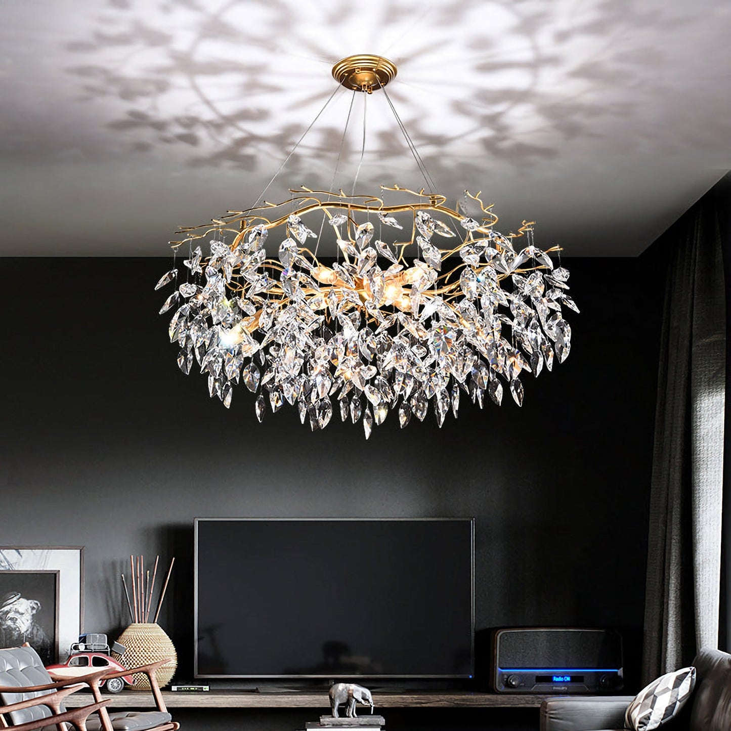 Korewolamp Sofia Crystal Chandelier with multiple hanging crystal prisms and elegant metal frame, showcasing intricate design and illumination.