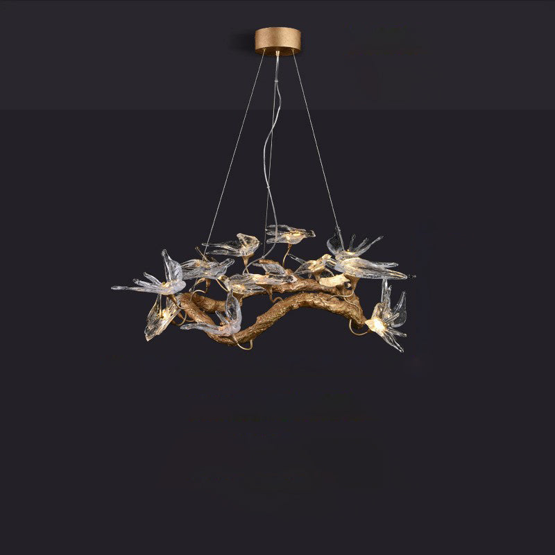 Elegant glass swallow chandelier by korewolamp featuring delicate glass bird shapes and a modern hanging design.