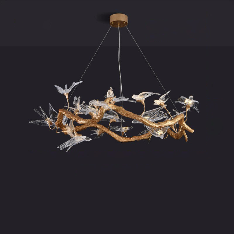 Korewolamp glass swallow chandelier with delicate glass bird figures hanging from a sleek metal frame, elegant and decorative lighting fixture.