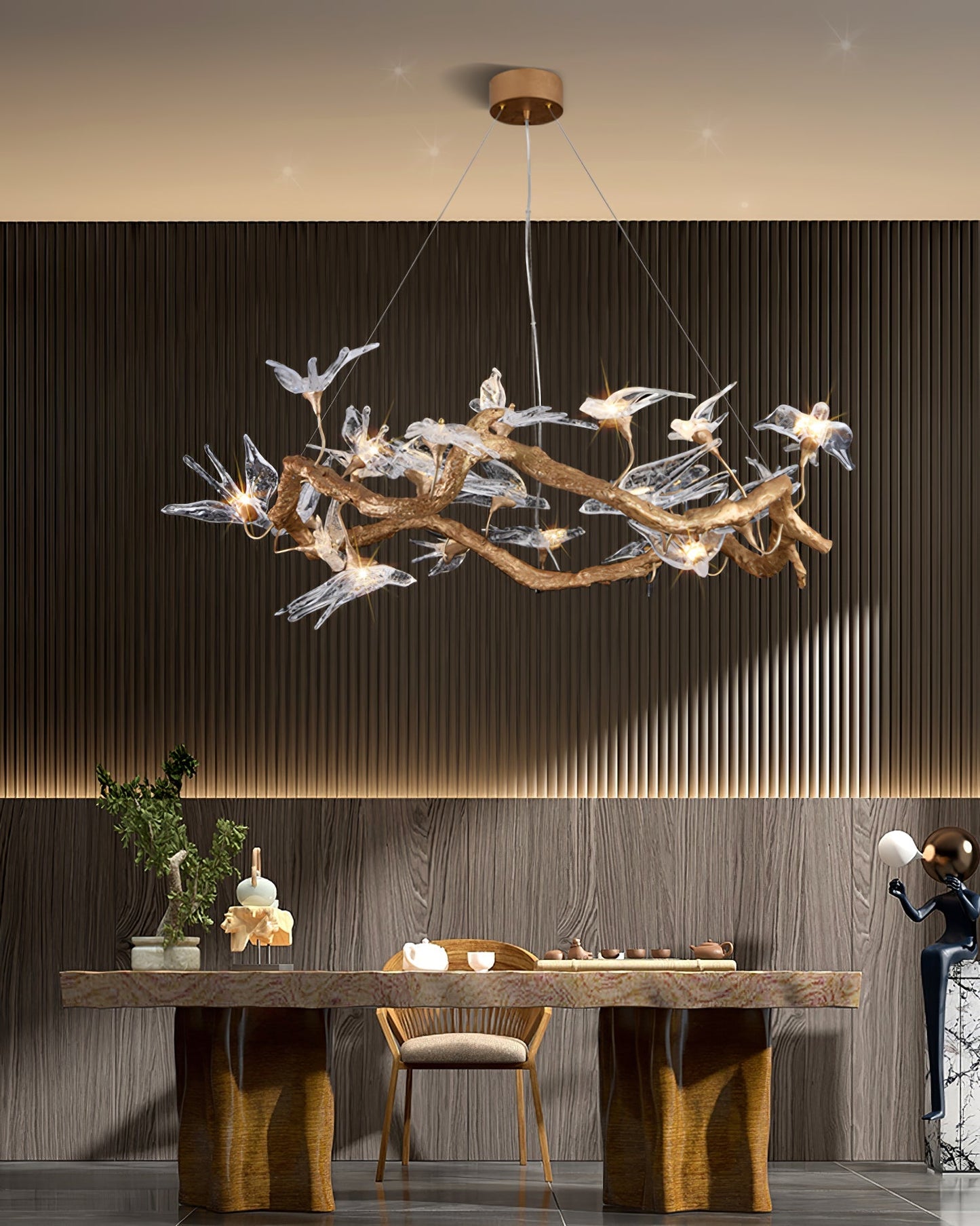 Elegant glass swallow chandelier by korewolamp featuring delicate glass birds hanging from a sleek fixture.