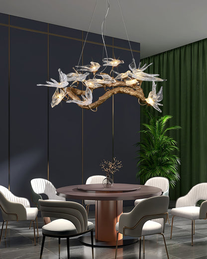 Korewolamp glass swallow chandelier with delicate glass bird sculptures hanging from a sleek metal frame.
