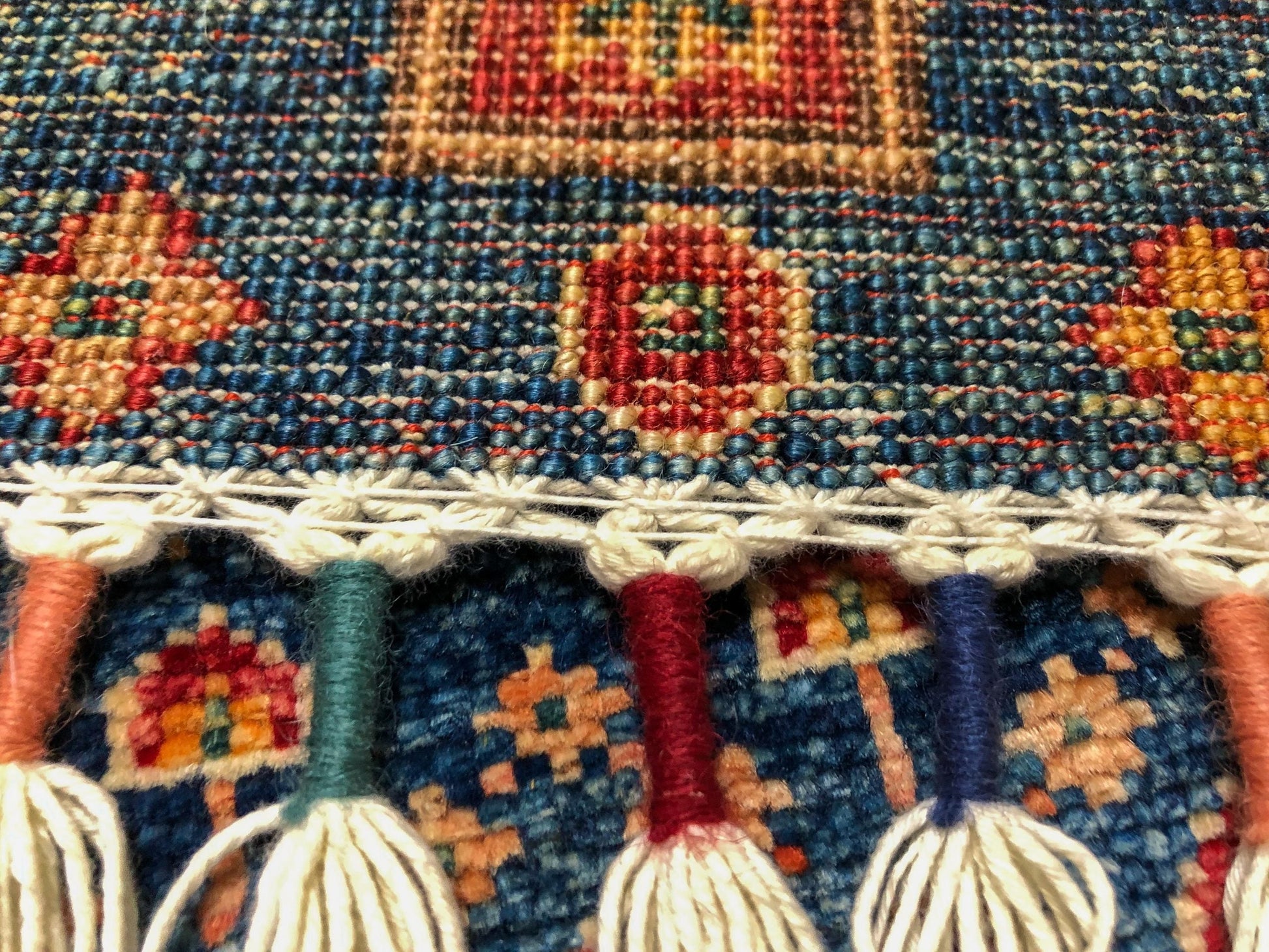 Closeup of Kirishian Rugs Gabbeh Khorjin in blue, 4x6 ft, showcasing traditional woven pattern on a handwoven textile.