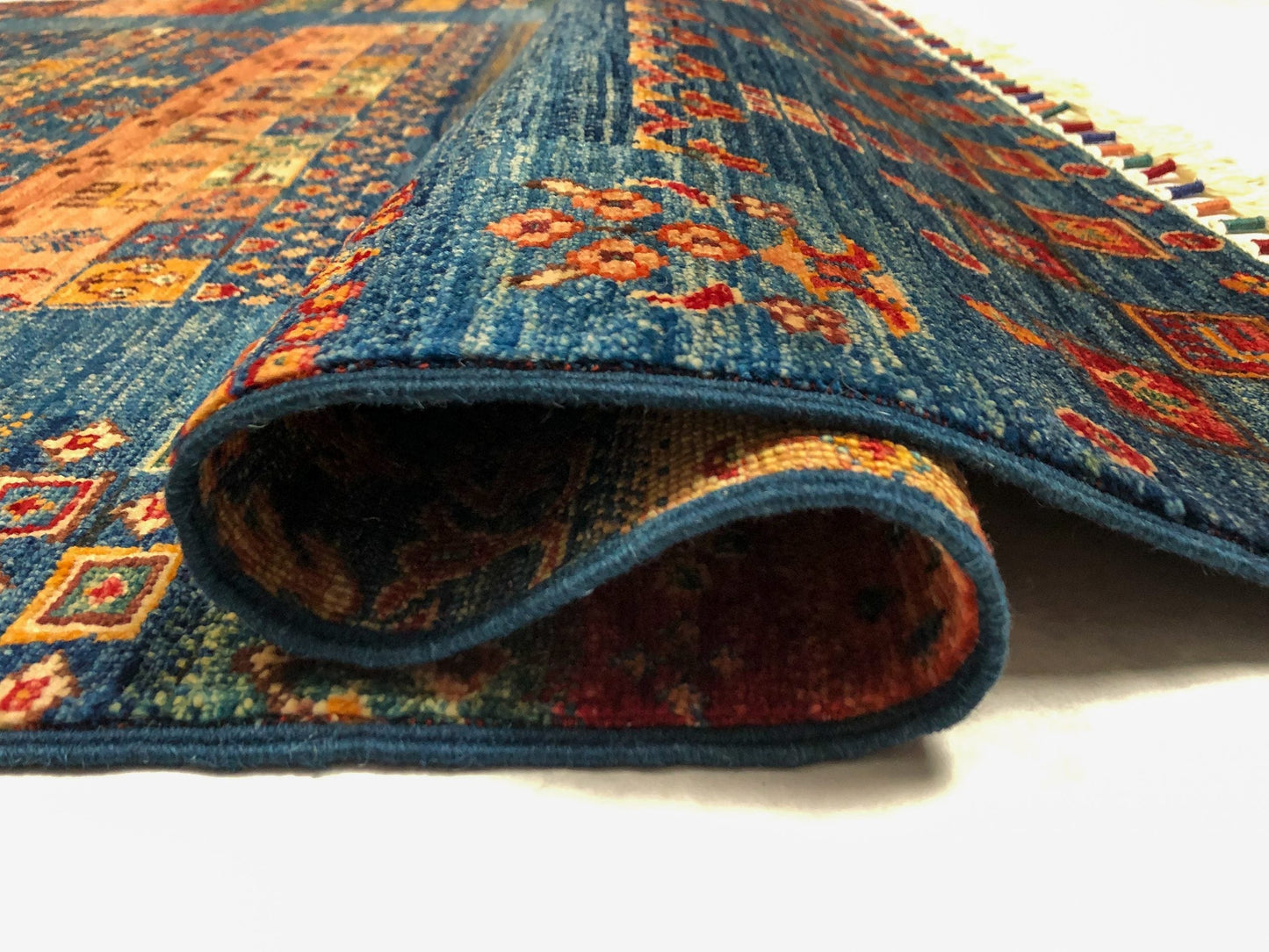 Blue Gabbeh Khorjin rug from Kirishian Rugs, 4x6 feet, with traditional geometric patterns, closeout style in natural fiber quality.
