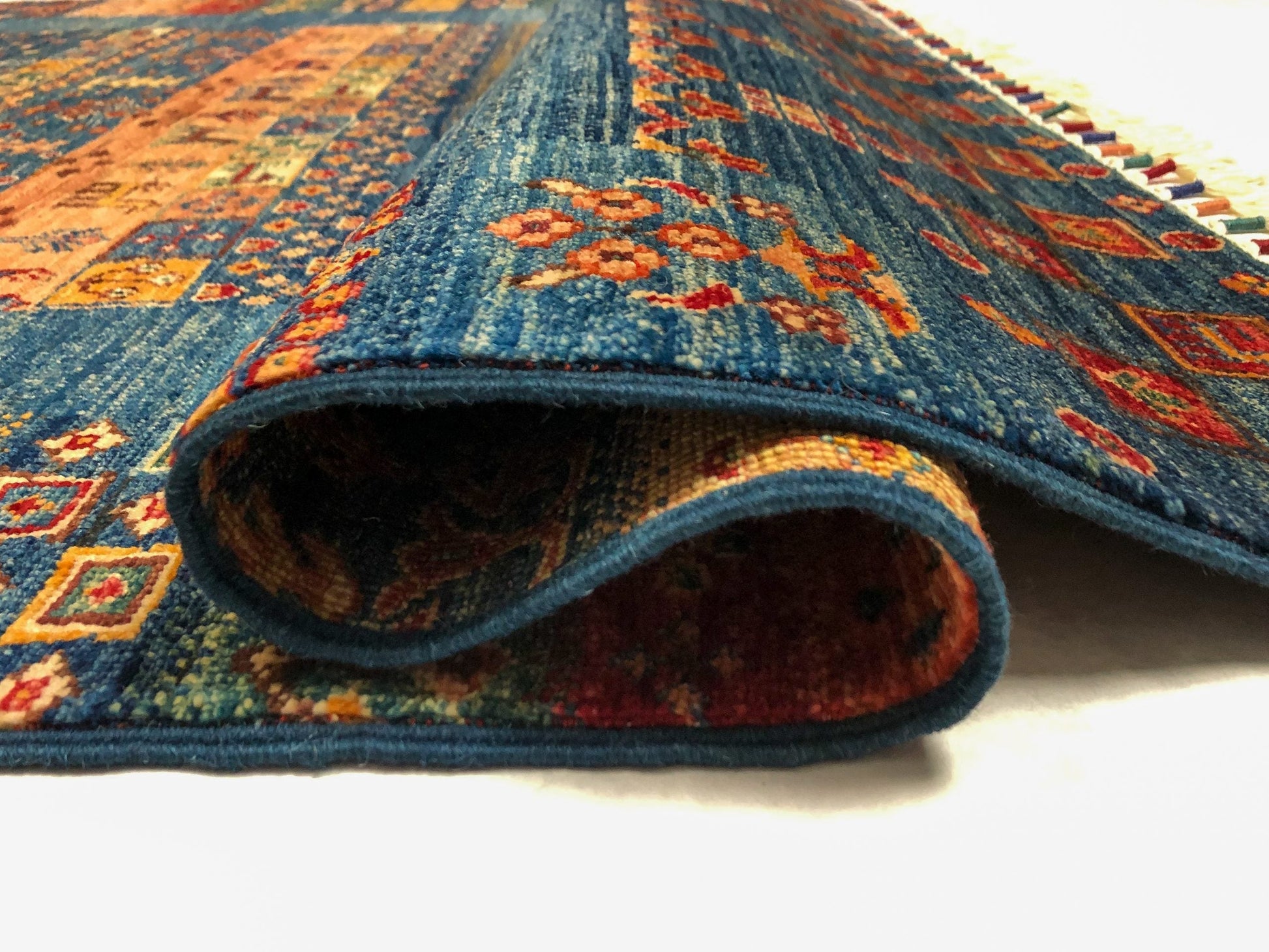 Blue Gabbeh Khorjin rug from Kirishian Rugs, 4x6 feet, with traditional geometric patterns, closeout style in natural fiber quality.
