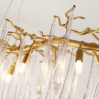 Korewolamp Aqua Makrama crystal chandelier with teardrop-shaped crystals hanging from a metal frame.
