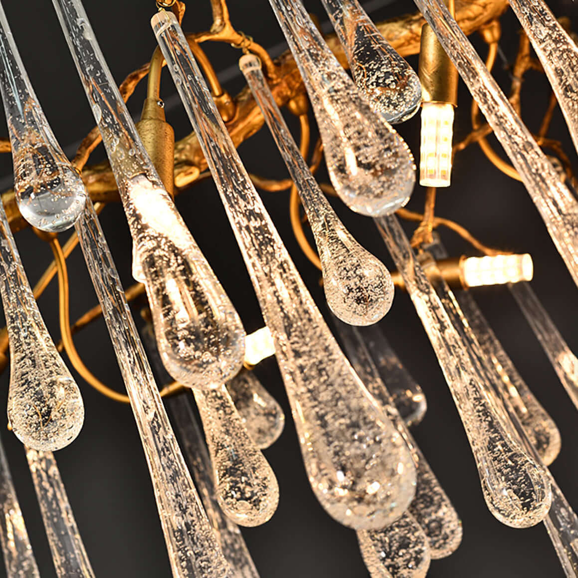 Korewolamp Aqua Makrama chandelier with long teardrop-shaped design and intricate macrame details for stylish home lighting.