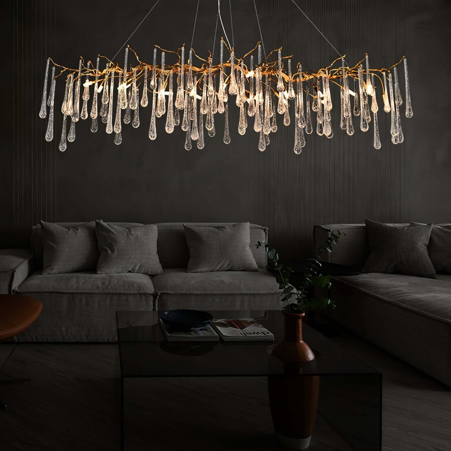 Korewolamp Aqua Makrama chandelier with long teardrop-shaped design and intricate macrame details hanging beautifully.