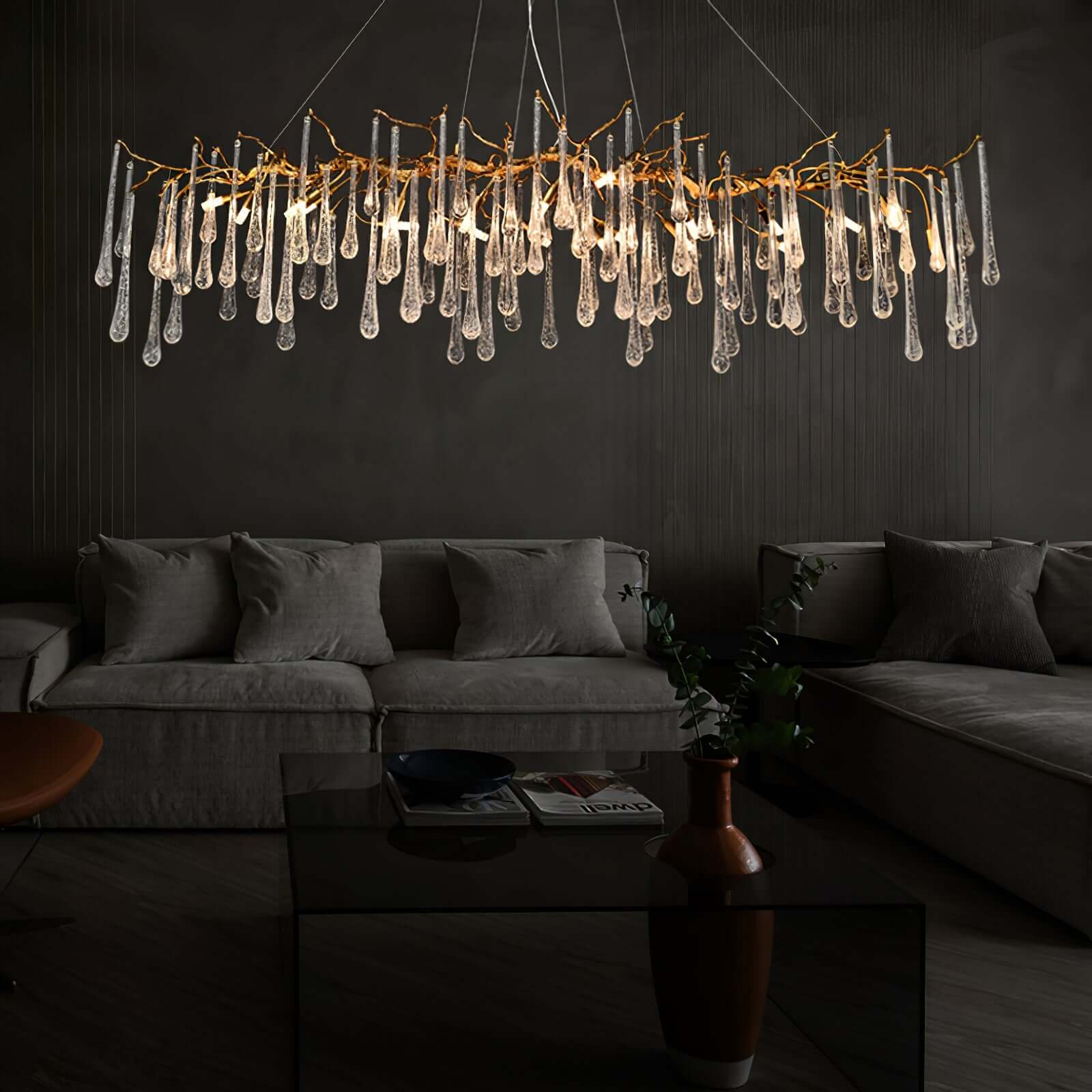 Korewolamp Aqua Makrama chandelier with long teardrop-shaped design and intricate macrame details hanging beautifully.