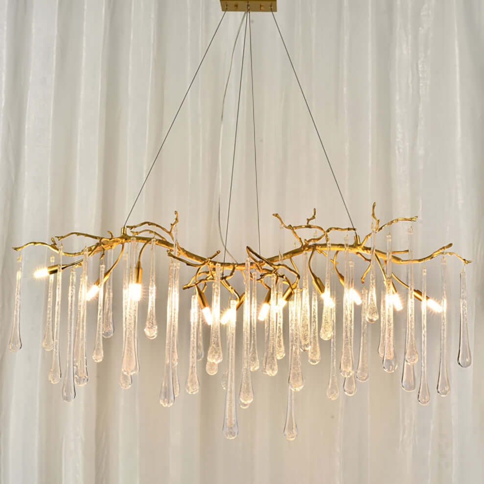 Korewolamp Aqua Makrama chandelier with long teardrop design, featuring intricate macrame details and elegant hanging ornaments.