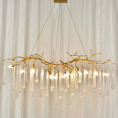 Korewolamp Aqua Makrama chandelier with long teardrop design, featuring intricate macrame details and elegant hanging ornaments.