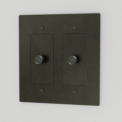 Bronze brass 3-way rotary dimmer switch by Residence Supply, 2-gang with patina finish and rotary control knobs.