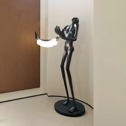 Tilt-head human sculpture floor lamp by korewolamp featuring a modern art-inspired design with a tall, sculptural standing lamp.