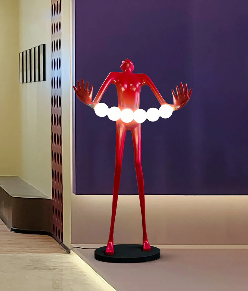 Tilt-head human sculpture floor lamp by korewolamp featuring a modern design with a sculpted human figure and adjustable tilt head.