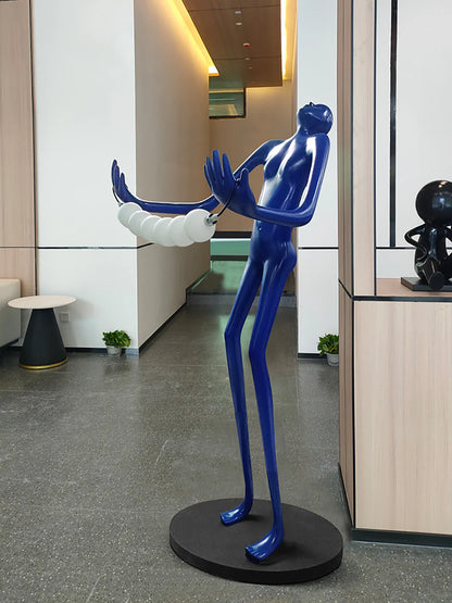 Floor lamp featuring a tilt-head human sculpture design by korewolamp, with a modern artistic style and sleek finish.