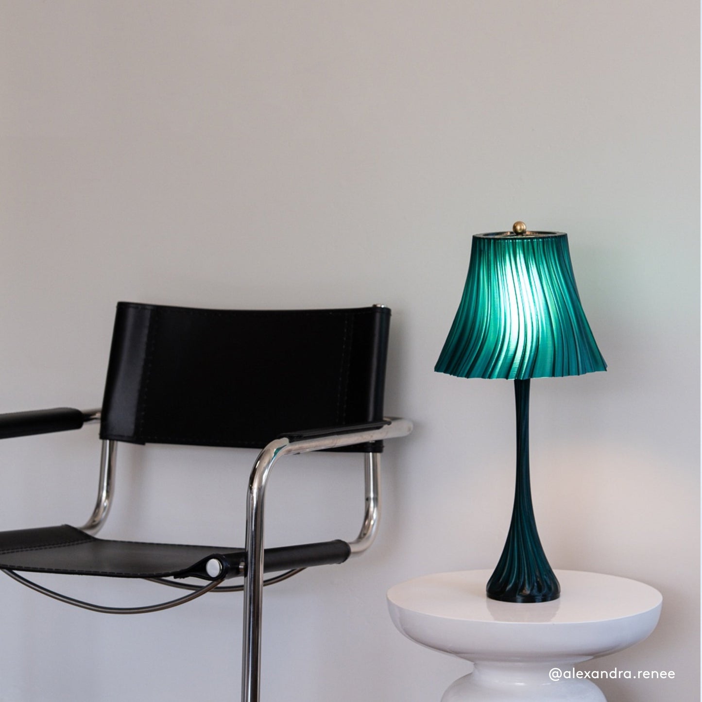 Wooj Design pleat lamp with a fabric shade featuring elegant pleats and a sleek base, ideal for modern home lighting.