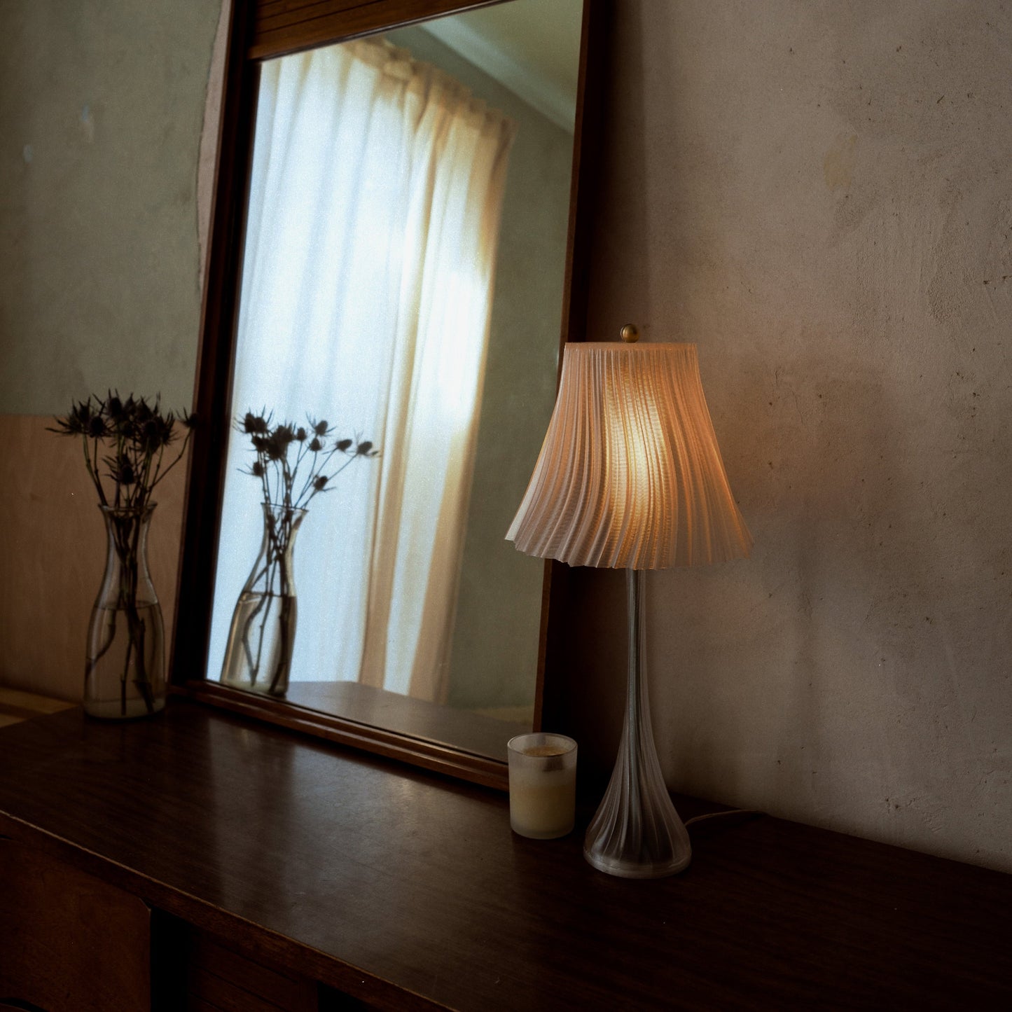 Wooj Design Pleat Lamp with fabric shade and elegant pleated design, perfect for modern living room or bedroom lighting.