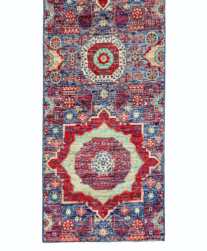 Afghan-made Mamluk 12-foot runner rug by OneKind from Kirishian Rugs, showcasing intricate traditional patterns and vibrant colors.