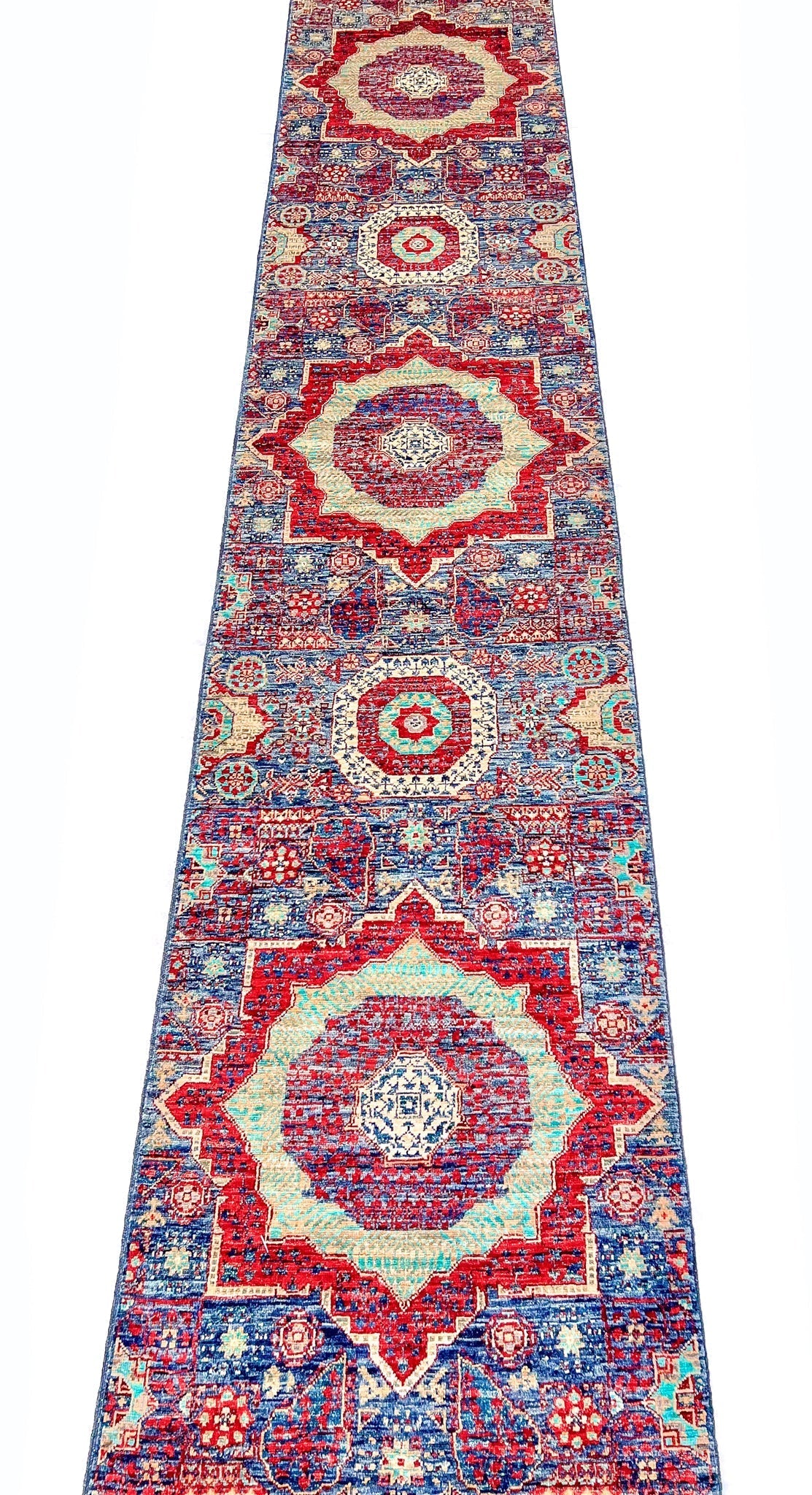 Afghan-made Mamluk 12-foot runner rug by OneKind from Kirishian Rugs, featuring intricate traditional geometric patterns on woven textile.