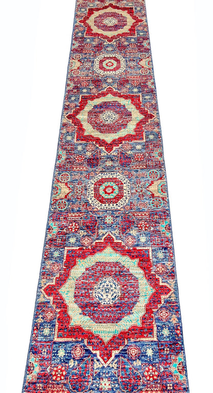 Afghan-made Mamluk 12-foot runner rug by OneKind from Kirishian Rugs, featuring intricate traditional geometric patterns on woven textile.