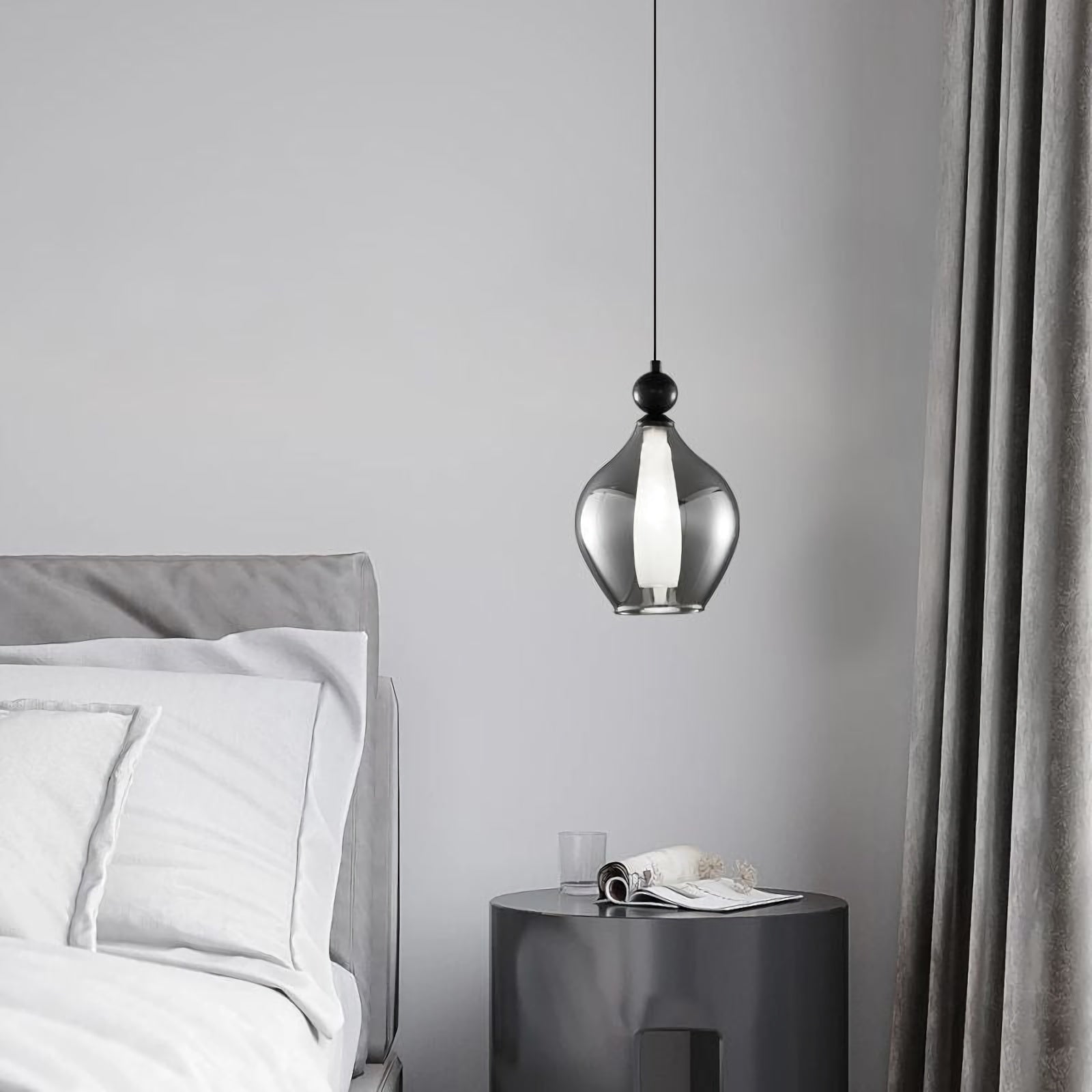 Korewolamp Vista glass pendant light hanging with clear glass shade and modern design, ideal for contemporary interior decor