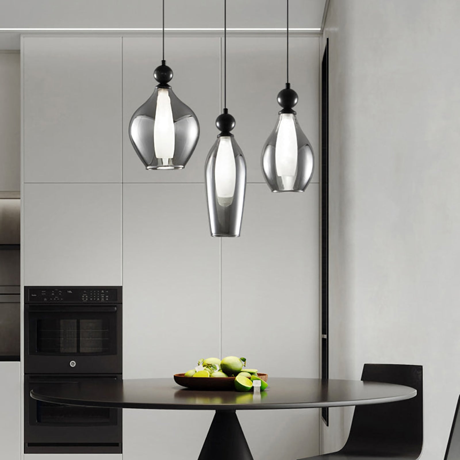 Korewolamp Vista glass pendant light hanging from ceiling with clear glass shade and modern design.