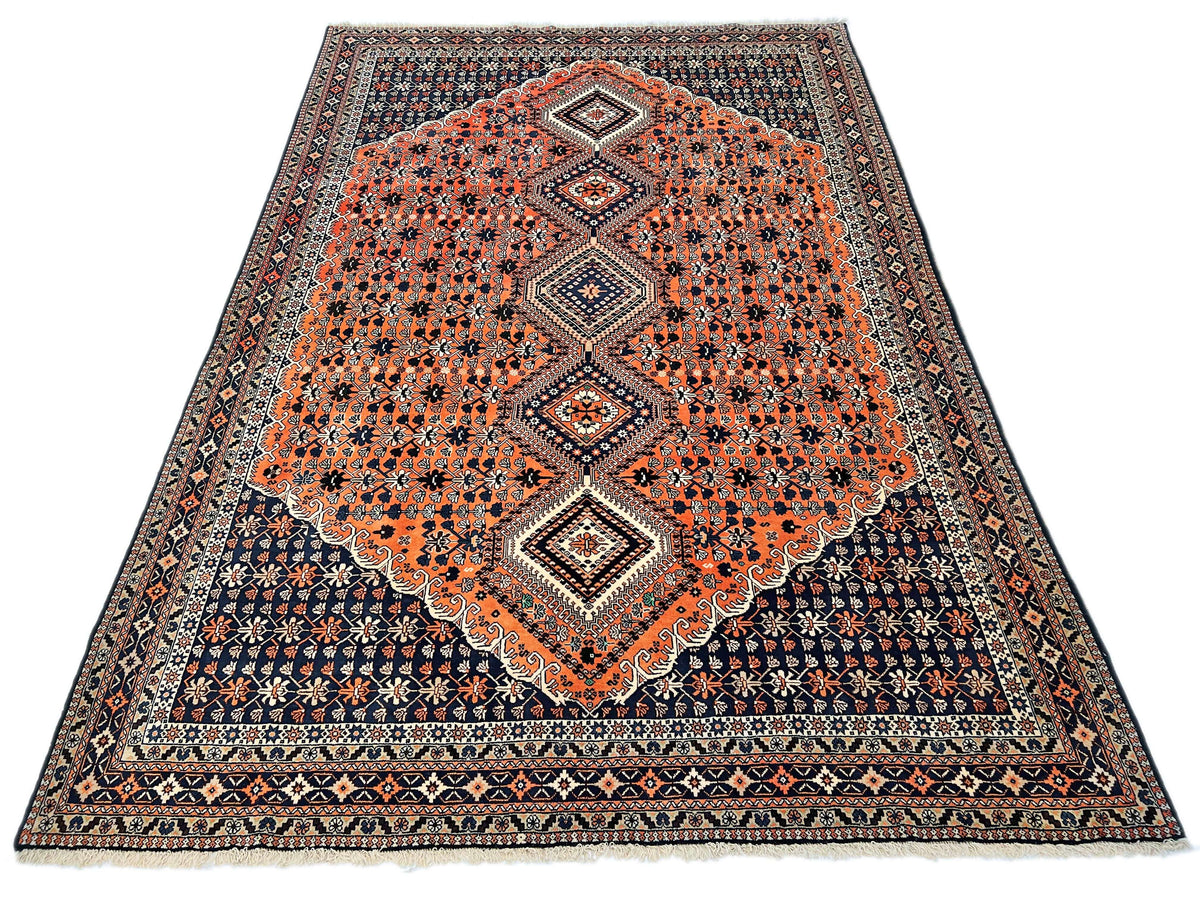 (6'09"x10'00") peach/indigo