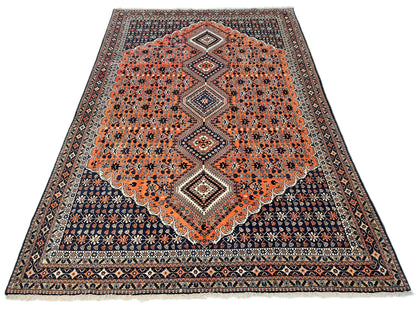 (6'09"x10'00") peach/indigo