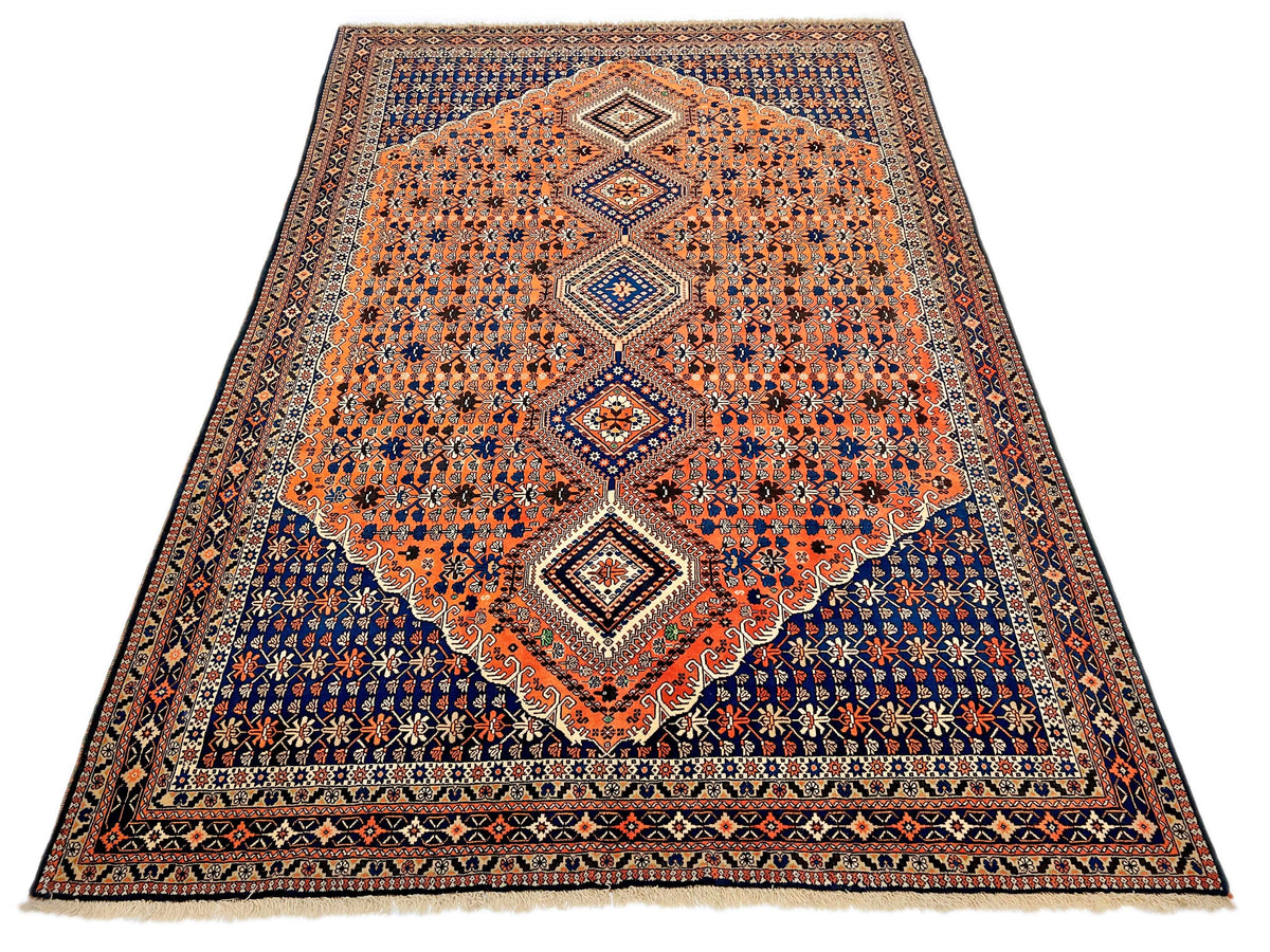 (6'09"x10'00") peach/indigo