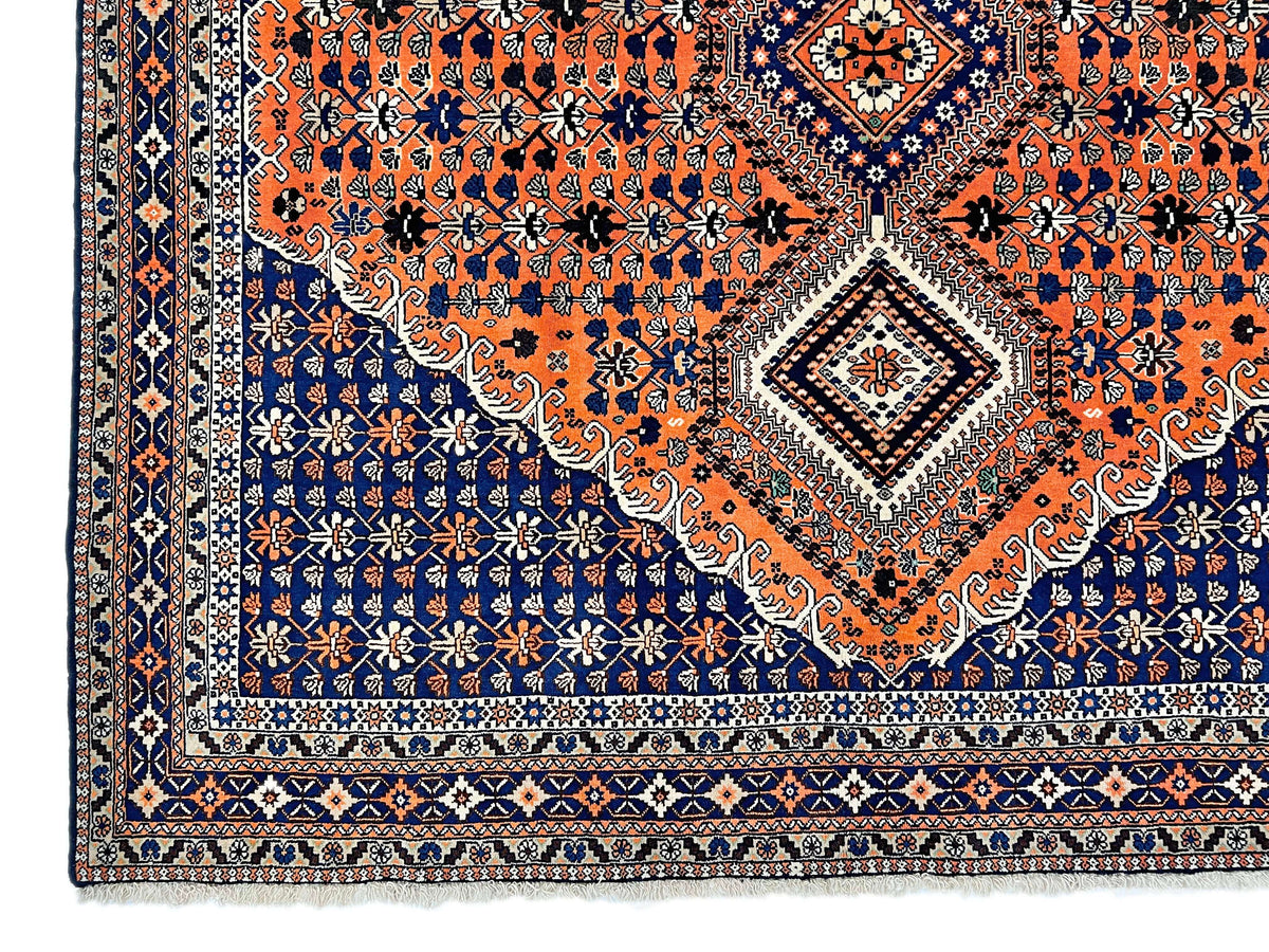 (6'09"x10'00") peach/indigo