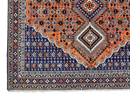 (6'09"x10'00") peach/indigo