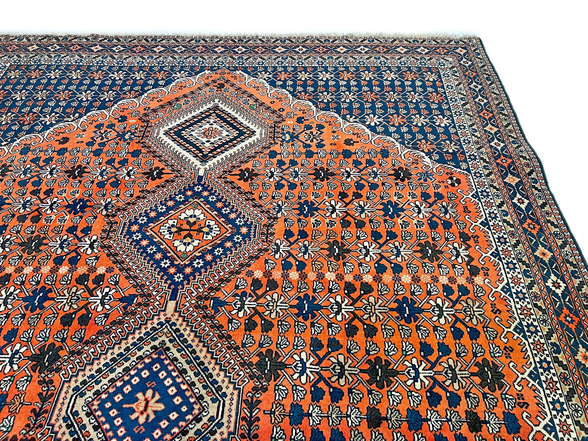 (6'09"x10'00") peach/indigo