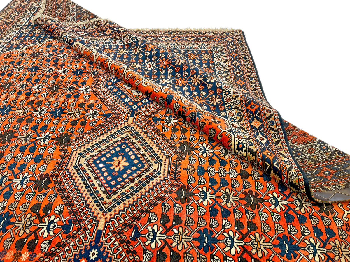(6'09"x10'00") peach/indigo