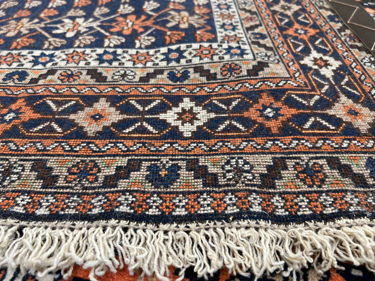 (6'09"x10'00") peach/indigo