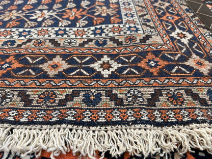 (6'09"x10'00") peach/indigo